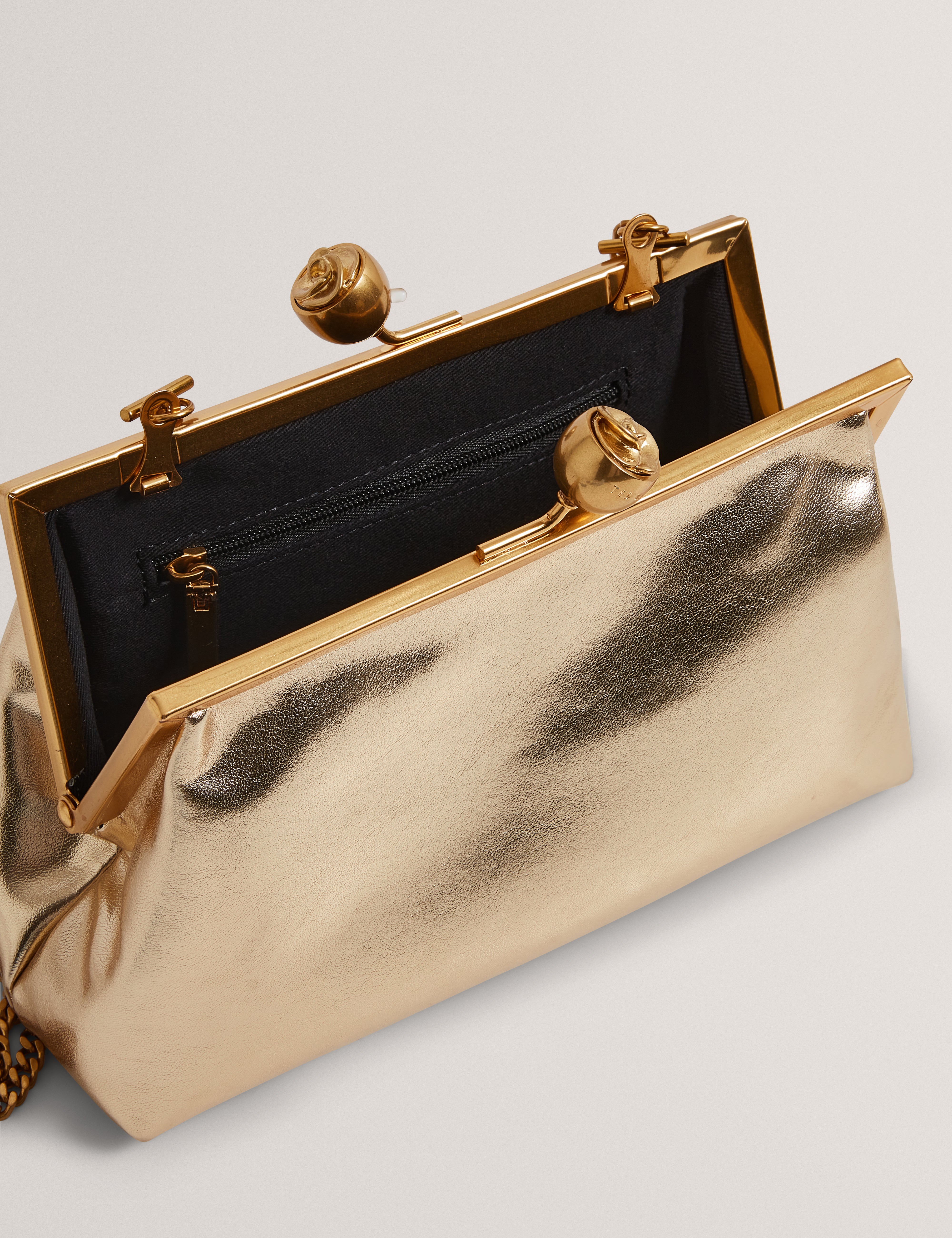 SYLVIII: Rose Detail Leather Metallic Clutch Bag