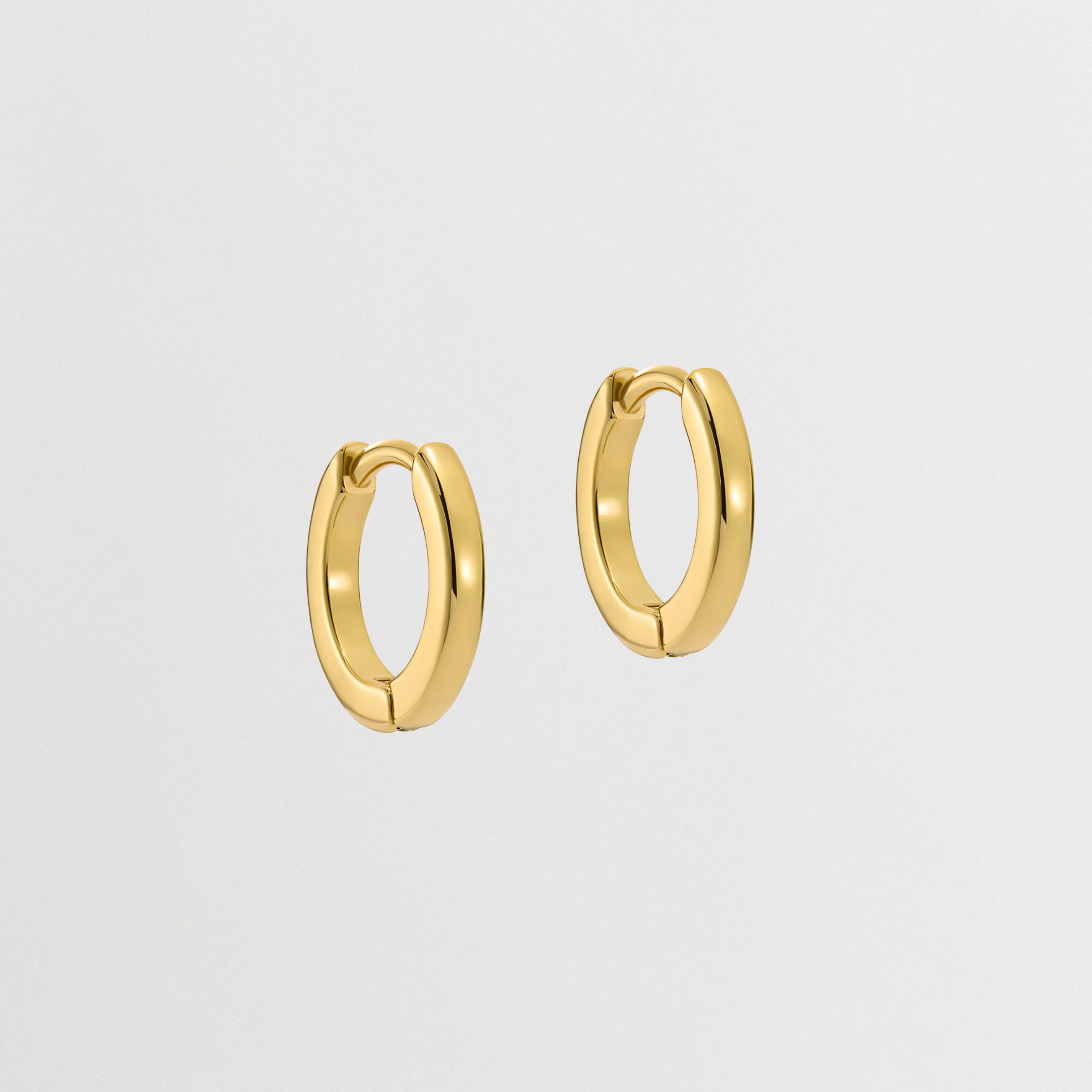 CRISLIE: Gold Logo Hoop Earrings