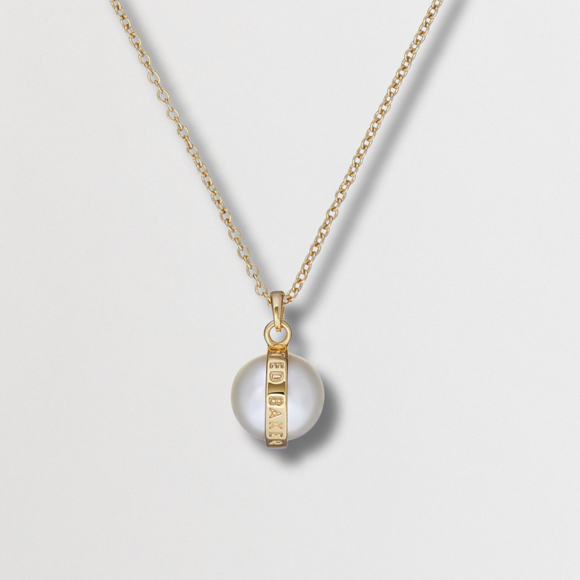 PERRETI: Logo Pearl Pendant Necklace