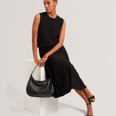 DEIRVA: Midi Skirt With Pleat Detail