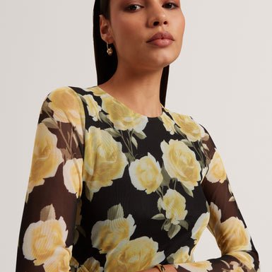 ELVYN: Printed Long Sleeve Bodycon Midi Dress