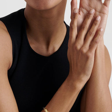 TORVI: Crystal Twist Hinged Bangle Bracelet