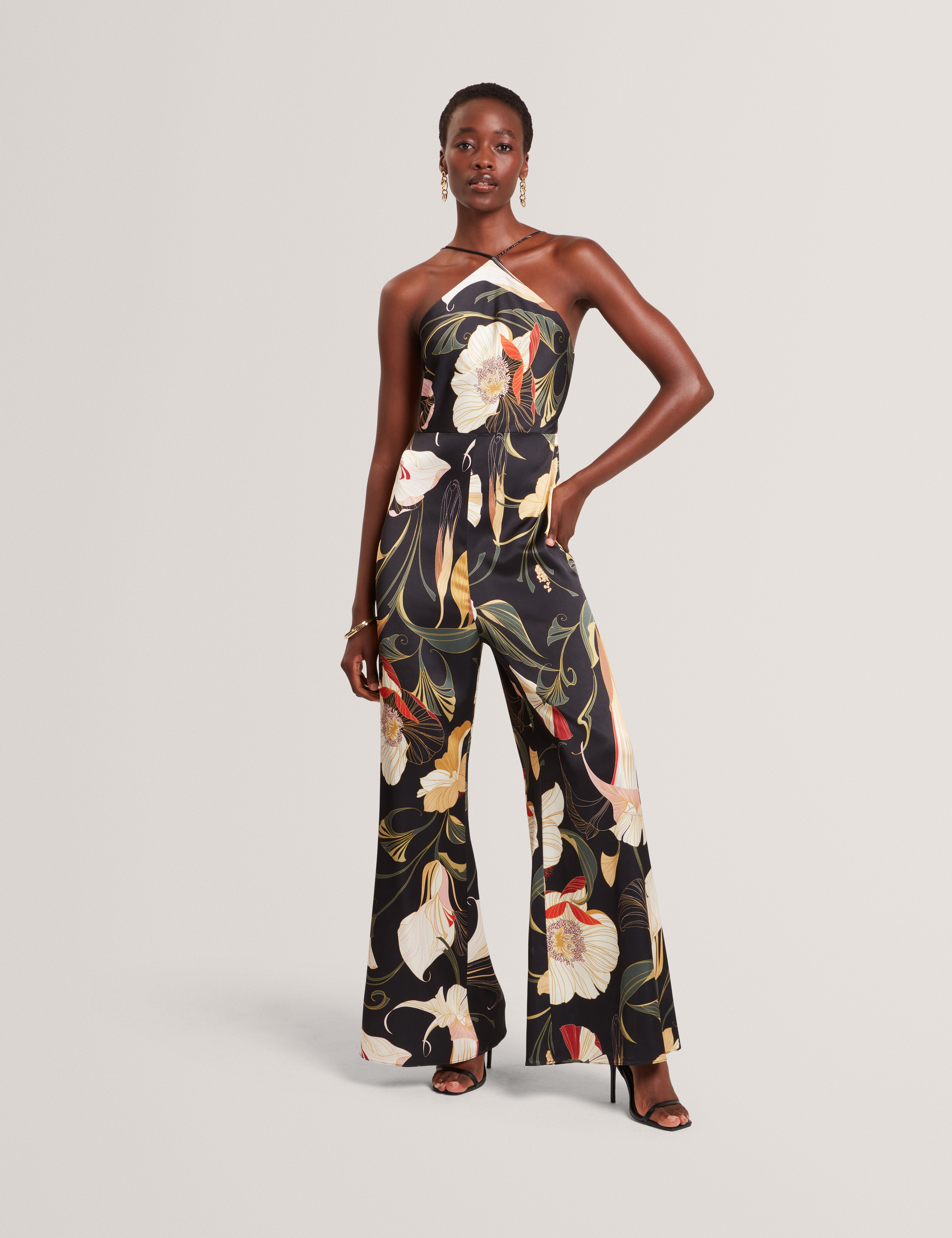 VEHRA: Printed Halter Neck Jumpsuit