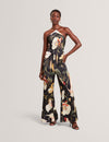 VEHRA: Printed Halter Neck Jumpsuit