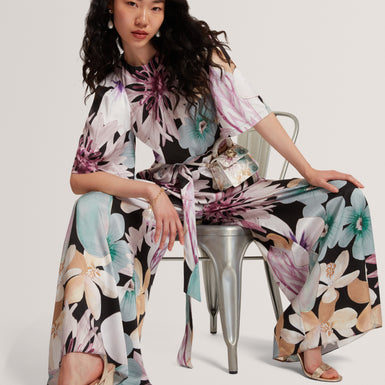 SUNSHI: Printed Drape Neck Detail Wide Leg Jumps