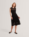 SUUSAAN: Knitted Skater Dress With Invisible Pane