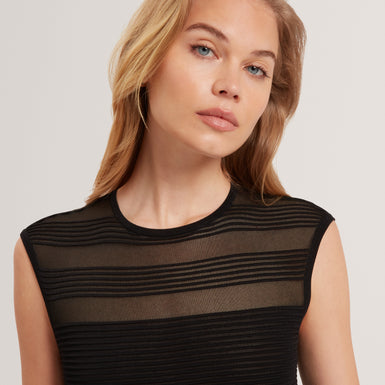 SUUSAAN: Knitted Skater Dress With Invisible Pane