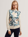 MERRNI: Printed Woven Front Knit Top