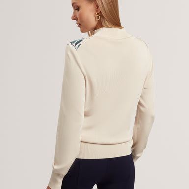 MERRNI: Printed Woven Front Knit Top