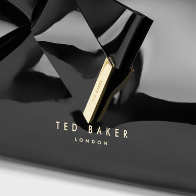 NICCO: KNOT BOW WASHBAG