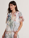 NANSII: Pleated Angel Sleeve Printed Top