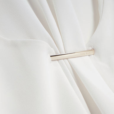 ALAYRA: Draped Bar Detail Top