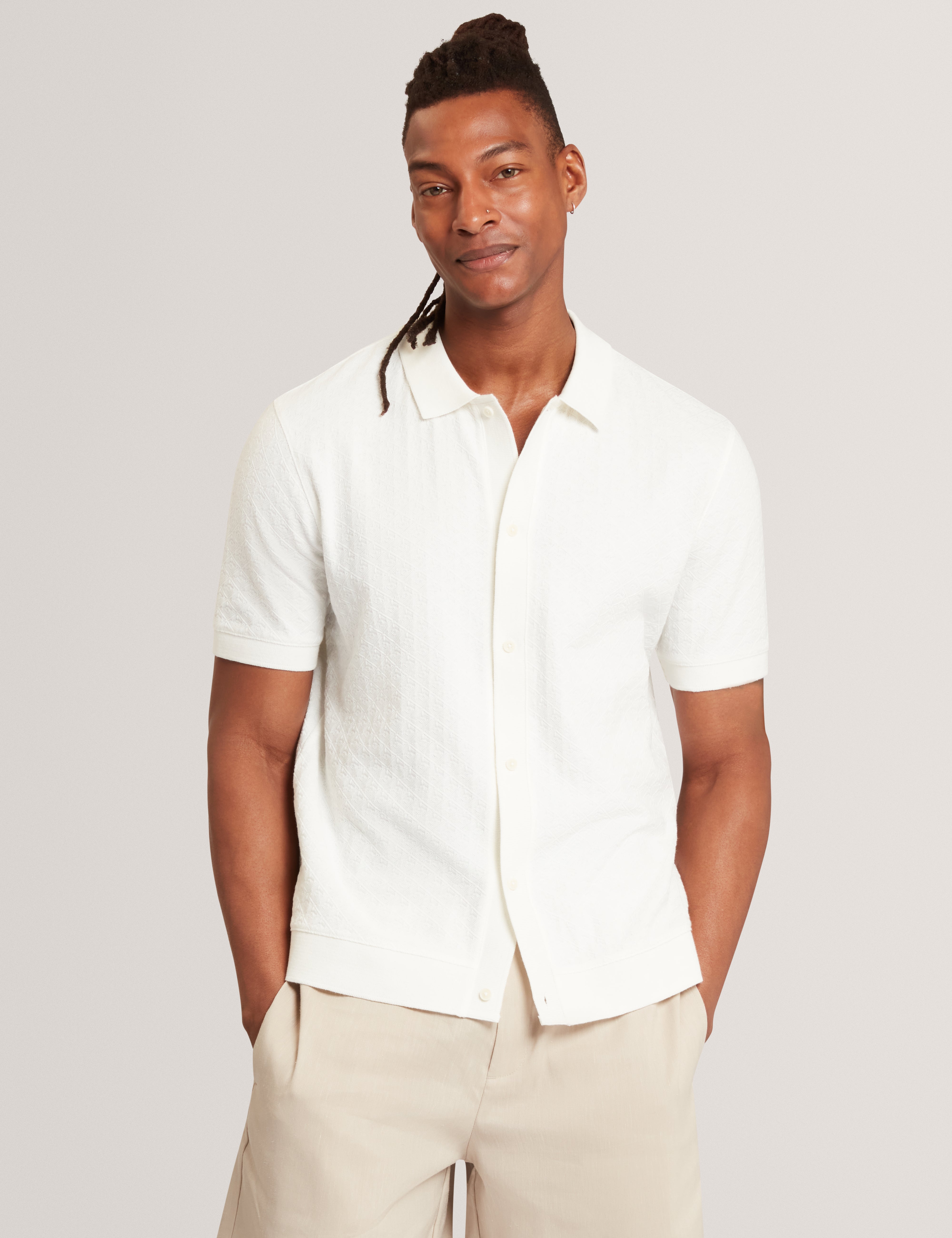 DOLTTEN: SS Textured Button Through Polo