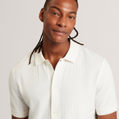 DOLTTEN: SS Textured Button Through Polo