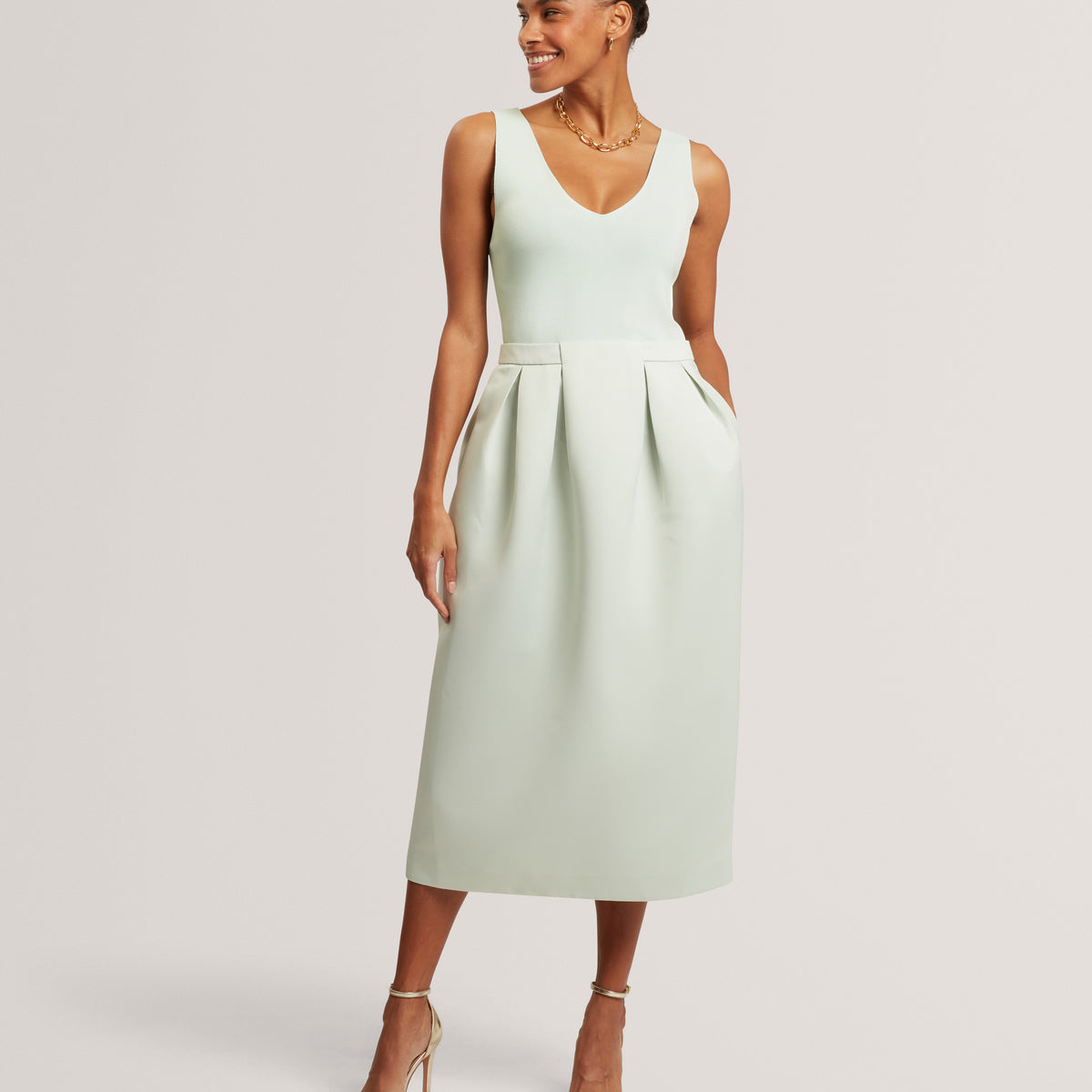 VERLENE: Mockable Midi Dress With Pleated Skirt – Poseidon Brands (Pty) Ltd