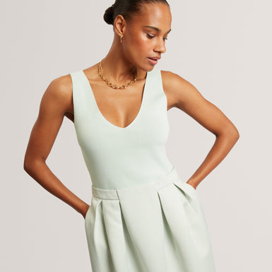VERLENE: Mockable Midi Dress With Pleated Skirt